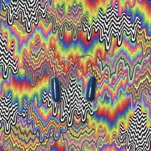 Handmade blue grow dinosaur pill earrings!